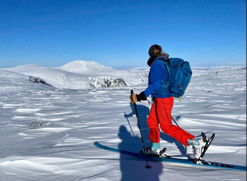 Ski touring along the Cairngorm Plateau, with Cairn Gorm beyond